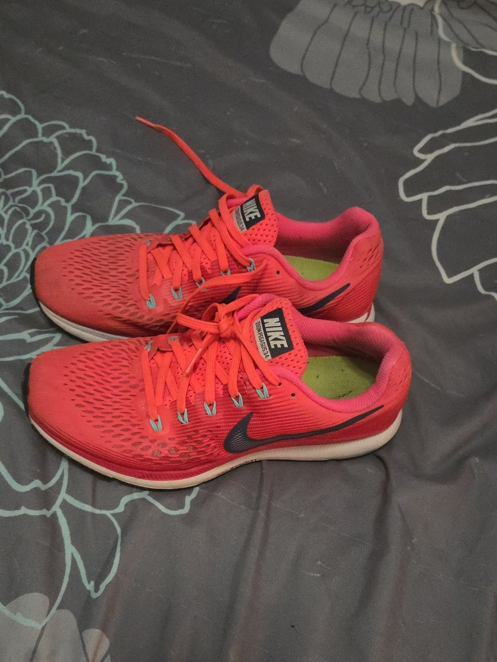 Nike Women's Coral-Pink Run Trainer with Black Swoosh